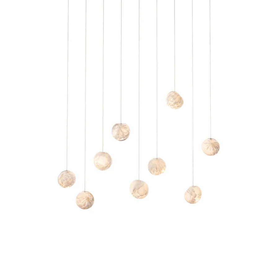 Exceptional Bocci 118 Linear Suspension Lamp with nine hand-blown glass pendants exhibiting a warm pale gold tone and translucent texture