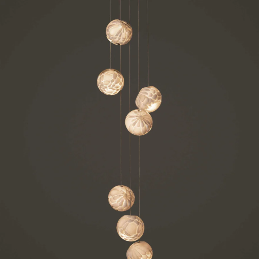 Captivating Bocci 118 Random Suspension Lamp with seven hand-blown glass pendants exhibiting feather-like textures and warm off-white hues