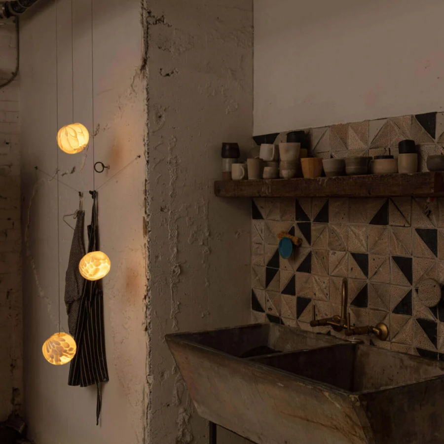 Superior Bocci 118 Random Suspension Lamp with woven metal cage and subtly textured translucent glasswork