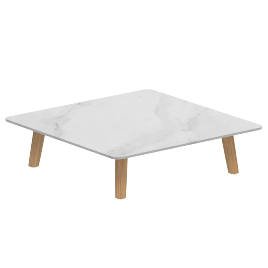 High-end Royal Botania Mambo Lounge coffee table, rectangular, with light marble-like top, and natural wooden base finish.