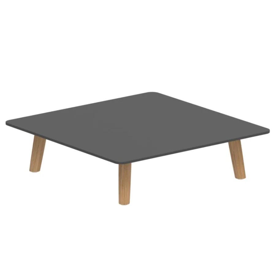 Comfortable Royal Botania Mambo Lounge coffee table in dark gray ceramic with warm-toned wooden legs and a square, low profile design.