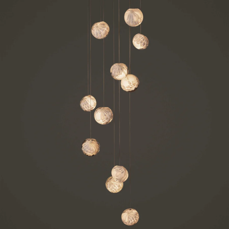 Exceptional Bocci 118 Random Suspension Lamp with eleven hand-blown glass pendants and pale beige petal-like surfaces illuminated within a white canopy