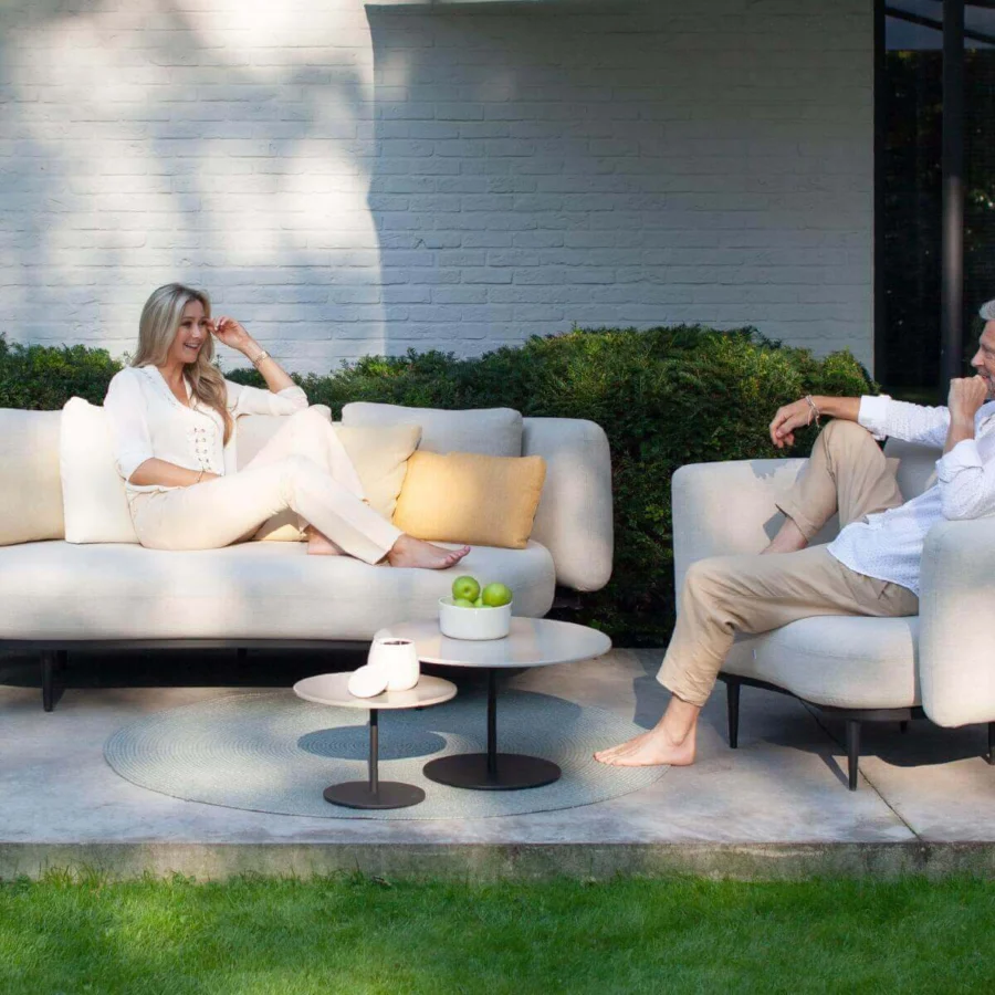 Captivating Royal Botania Organix Lounge sofa with light beige textile upholstery and sleek black aluminum base