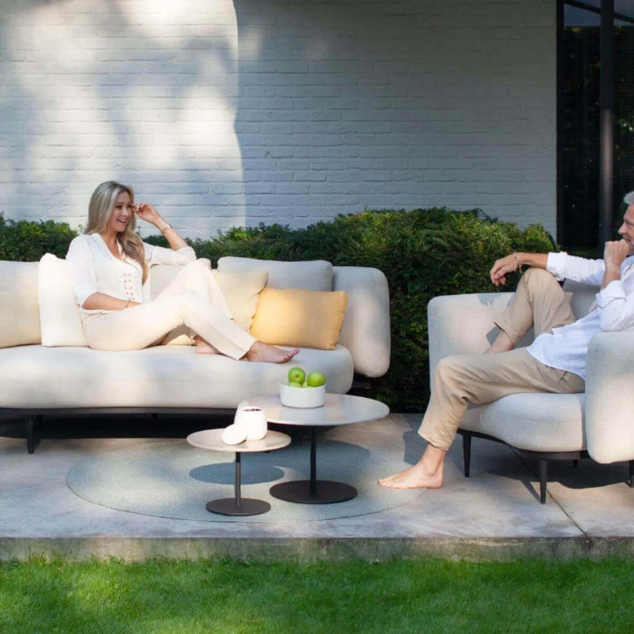 Exceptional Royal Botania Organix lounge chair crafted with neutral matte textile and dark metal legs
