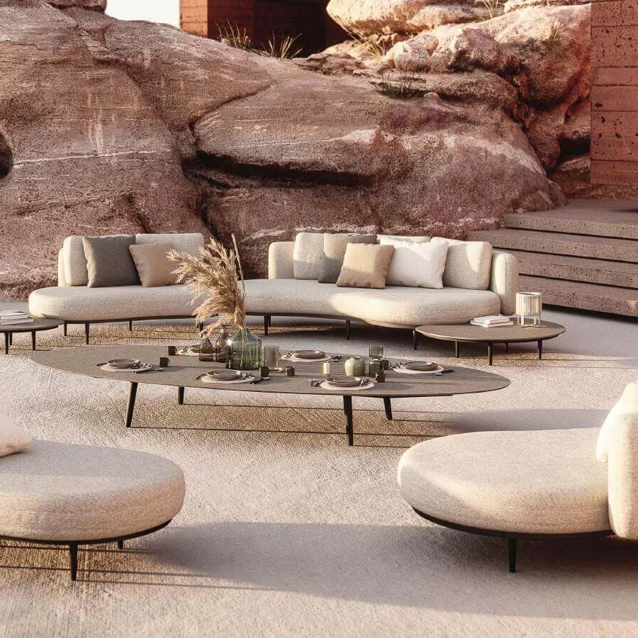 Superior Royal Botania Organix Lounge sectional with organic shapes and a dark aluminum base upholstered in beige cushions