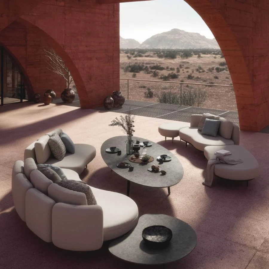 Captivating Royal Botania Organix Lounge sectional with organic kidney shapes upholstered in light beige textile and patterned cushions