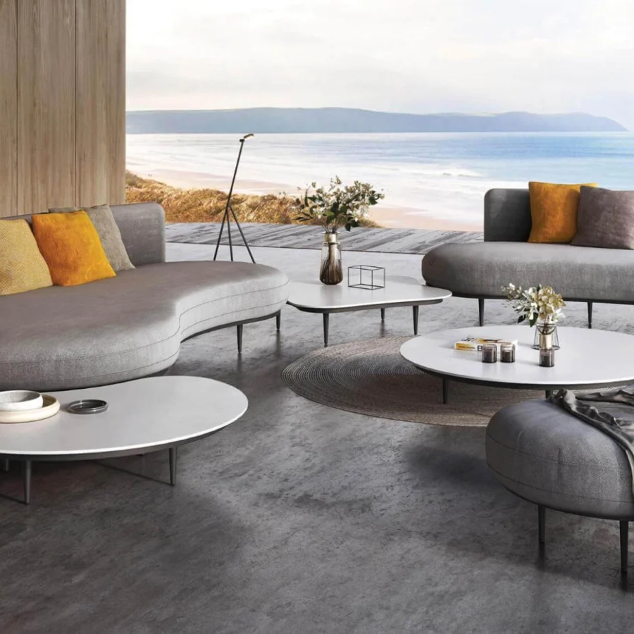 Elegant Royal Botania Organix lounge coffee table with shaped aluminum base and smooth ceramic top in matte white finish