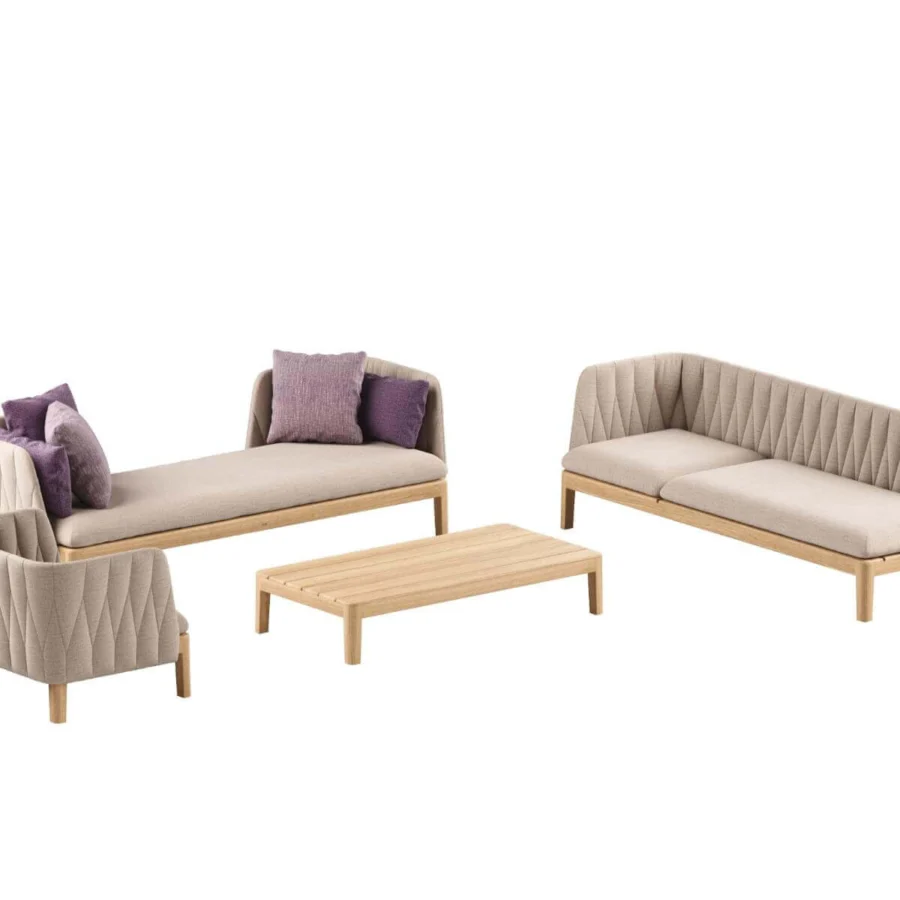 Distinguished Royal Botania Calypso lounge sectional with teak base, quilted light beige textile upholstery, and U-shaped stainless steel backrests