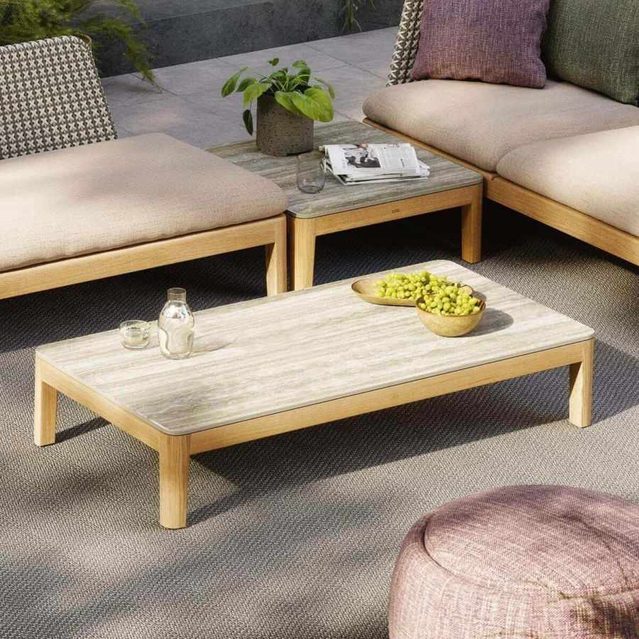 Exceptional Royal Botania Calypso lounge coffee table crafted in light-toned teak wood with a stone-like marbled tabletop