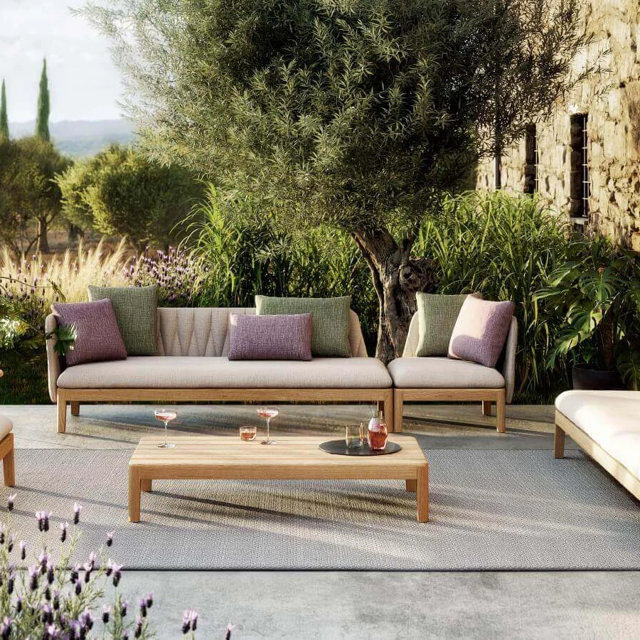 Elegant Royal Botania Calypso lounge coffee table crafted in teak wood with a natural tone and matte finish