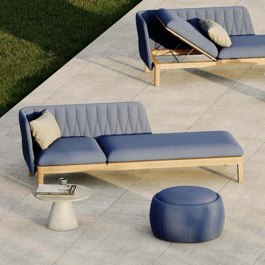 Distinguished Royal Botania Calypso lounger with reclining teak base and quilted cool blue textile upholstery paired with stainless steel
