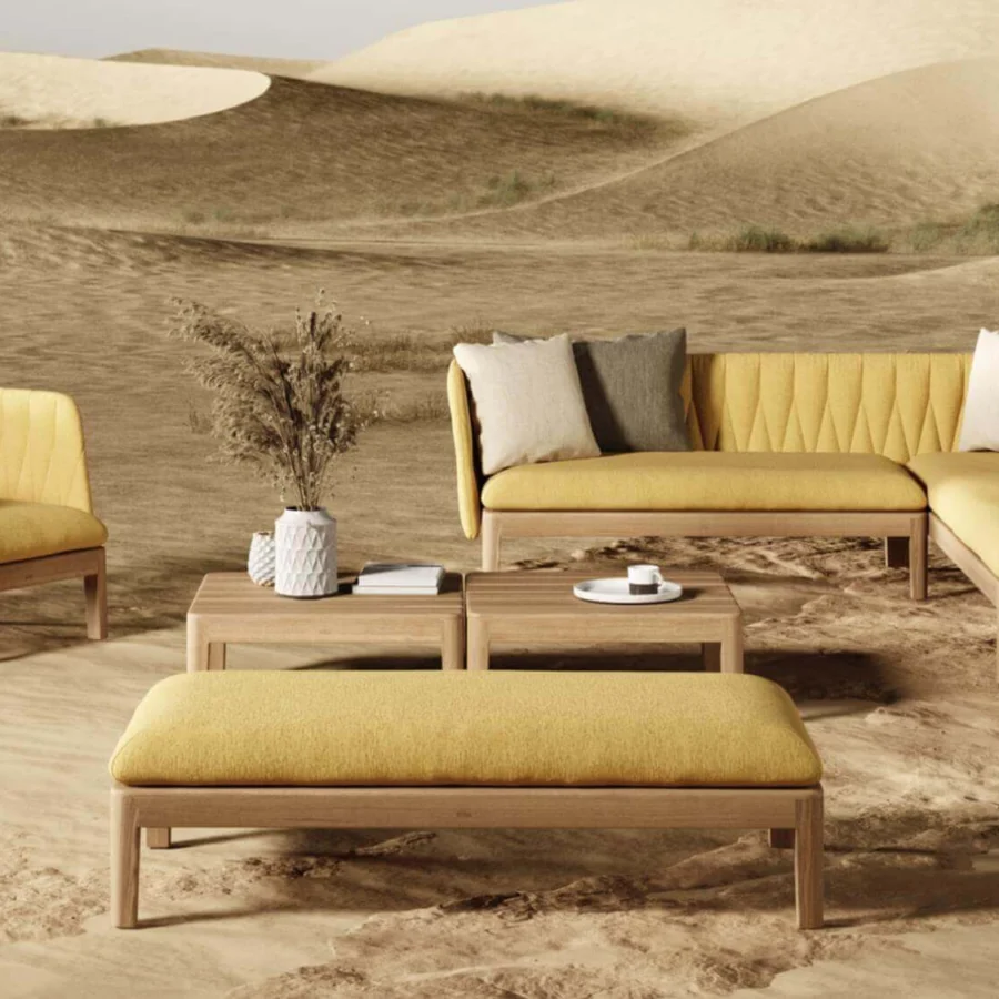 Distinguished Royal Botania Calypso lounge chair with quilted muted yellow textile and stainless steel teak base