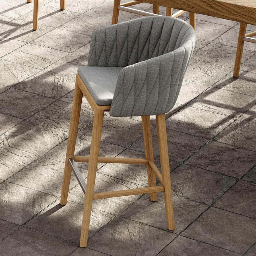 Superior Royal Botania Calypso stool with quilted gray textile and satin finish teak base crafted with stainless steel
