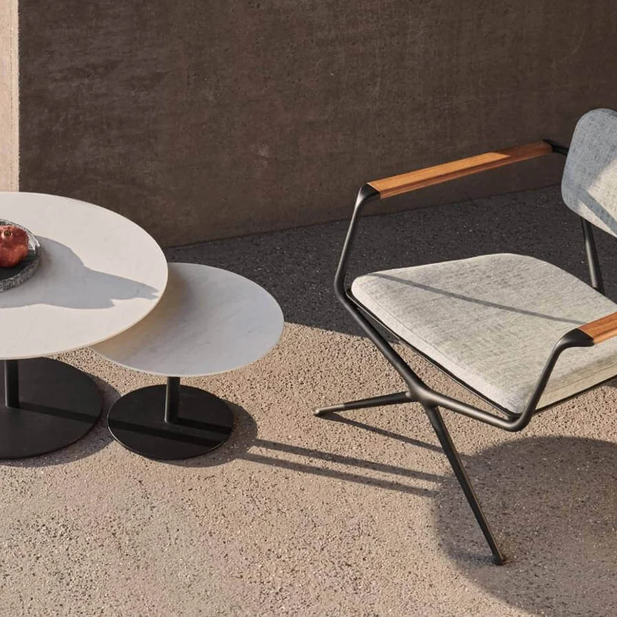 Elegant Royal Botania Butler side table with layered effect and matte black coated stainless steel base