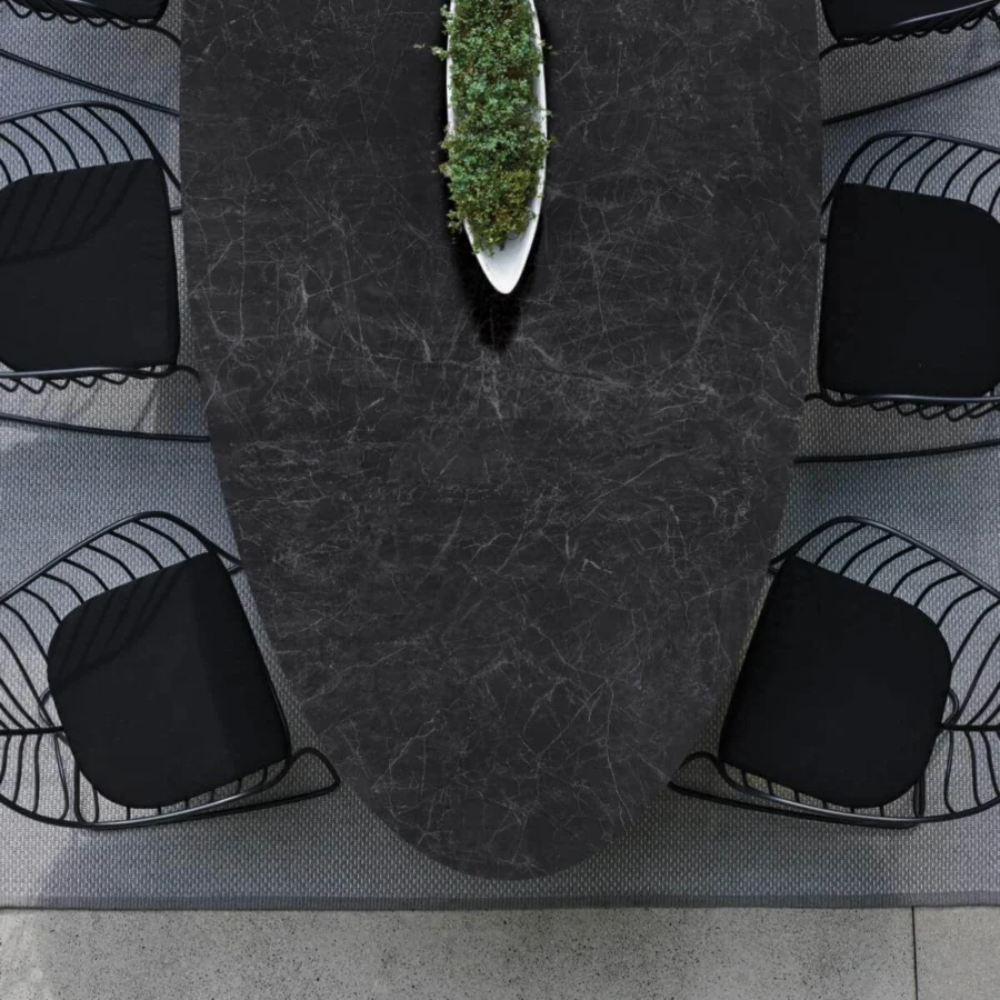 Exceptional Royal Botania Exes table with a dark ceramic top displaying lighter grey veining and coated aluminum base