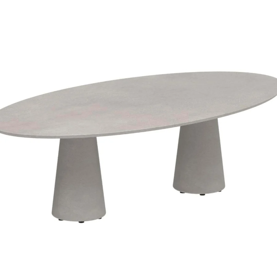 Exceptional Royal Botania Conix table with light gray concrete top and conical fibre-reinforced bases with polished surface