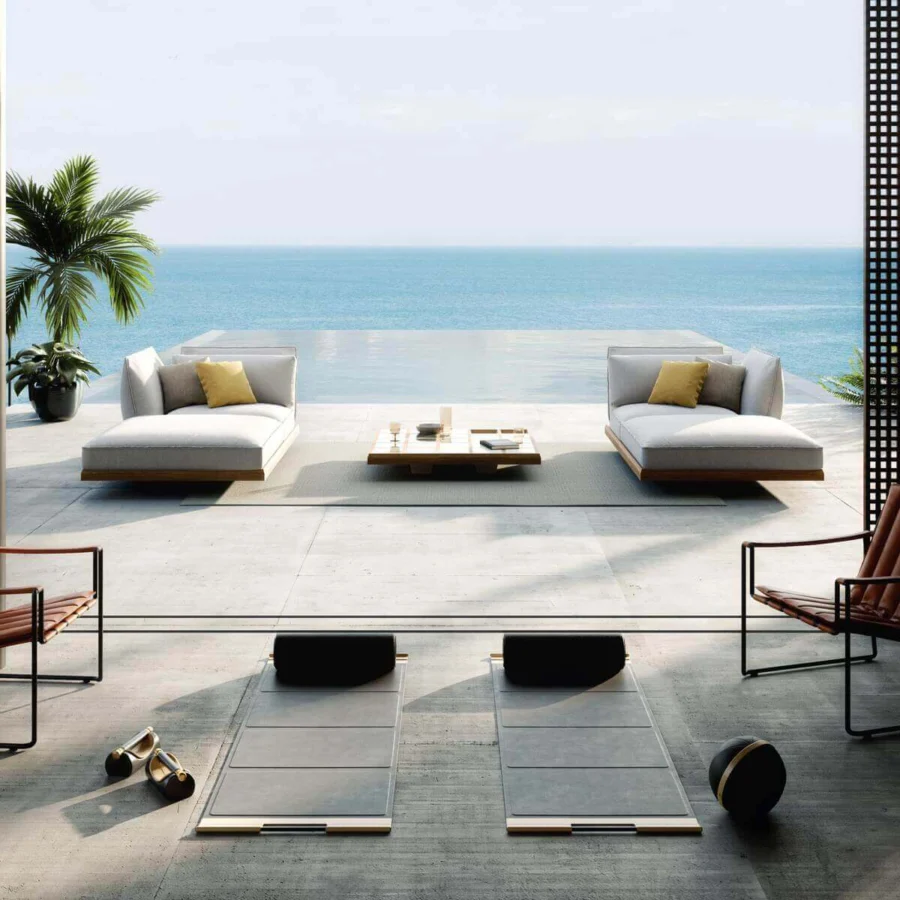 Elegant Royal Botania Strappy lounge chair with matte black coated stainless steel and medium brown eco-leather straps
