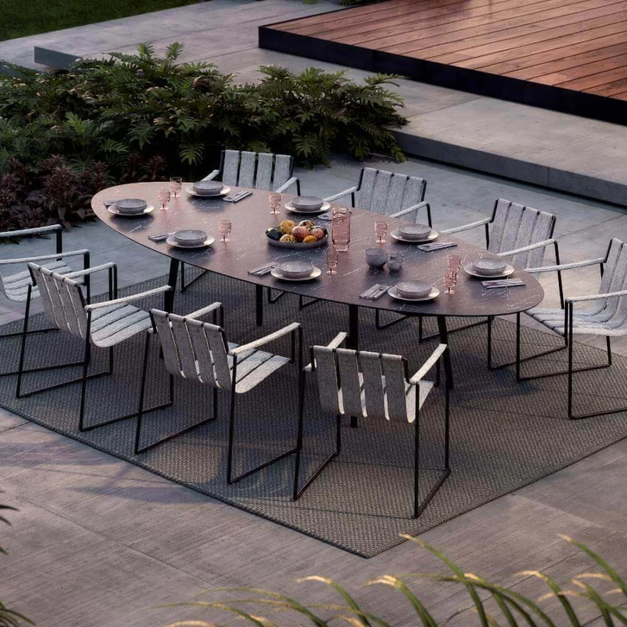Distinguished Royal Botania Styletto table with tapered legs in coated aluminum and gray ceramic top with matte black finish