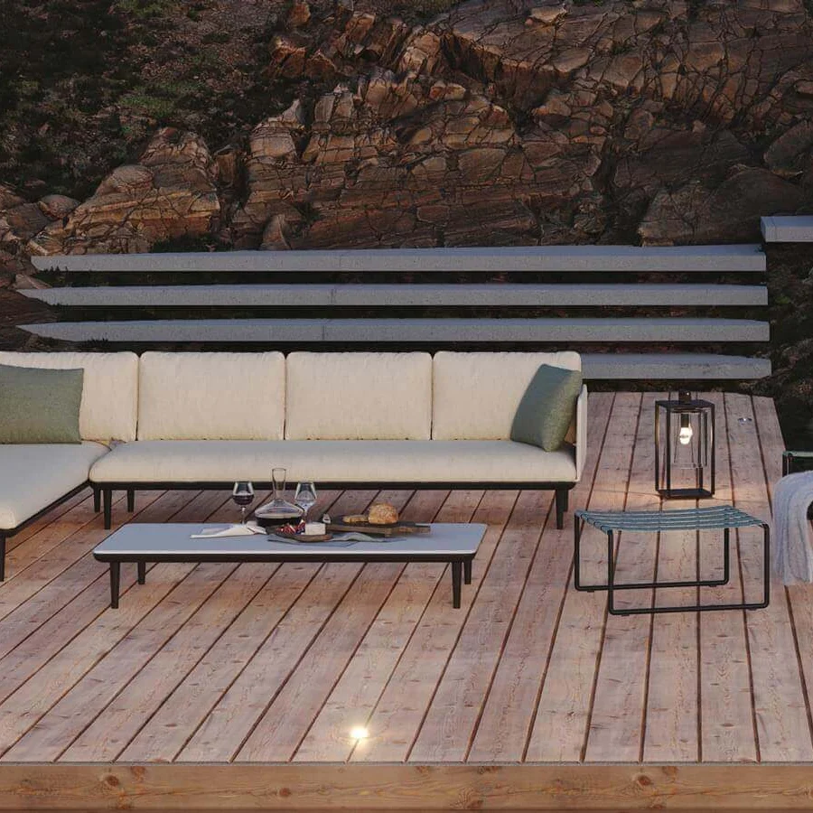 Superior Royal Botania Styletto Lounge sectional with plush light beige textile upholstery, dark metal legs and teak wood coffee table