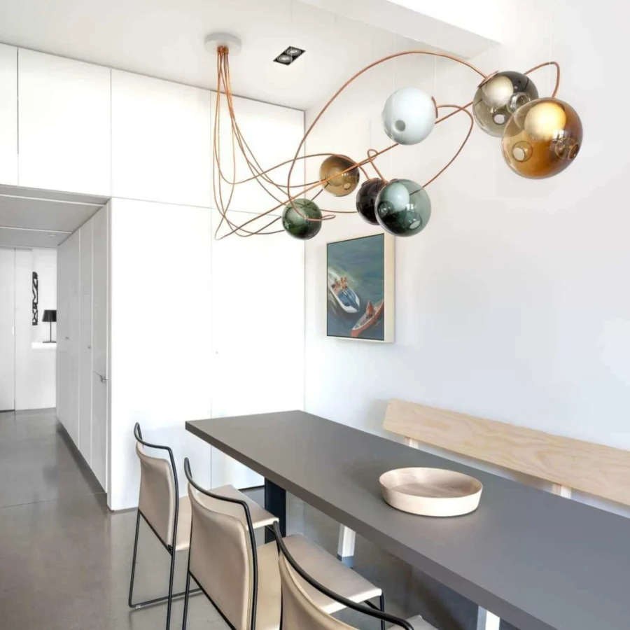 Captivating Bocci 28 Copper suspension lamp built with a dynamic orbital framework in natural copper and glass shades
