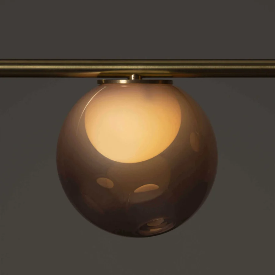 Distinguished Bocci 28 Stem suspension lamp with clear glass exterior, milk white interior and unlacquered brass stem structure