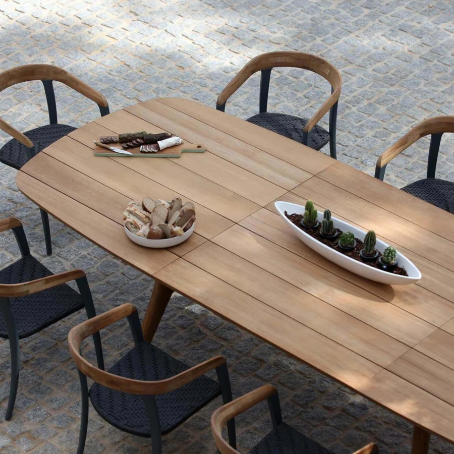 Distinguished Royal Botania Zidiz table crafted from teak wood with a light warm brown finish showcasing subtle grain