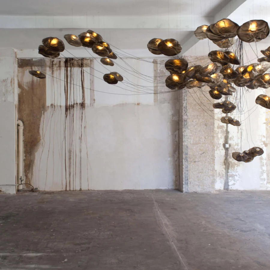 Exceptional Bocci 73 sculptural cable suspension lamp with golden-brown translucent blown glass and braided metal coaxial cable