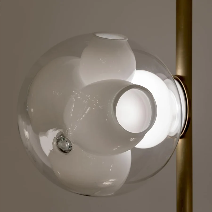 Lavish Bocci 38V Stem floor lamp crafted with clear glass exterior and milk white interior in a refined brass finish