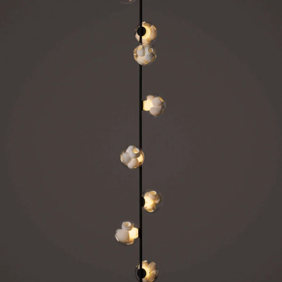 Distinguished Bocci 38V Stem ceiling lamp with black metal and clear glass spheres containing a milk white interior cavity