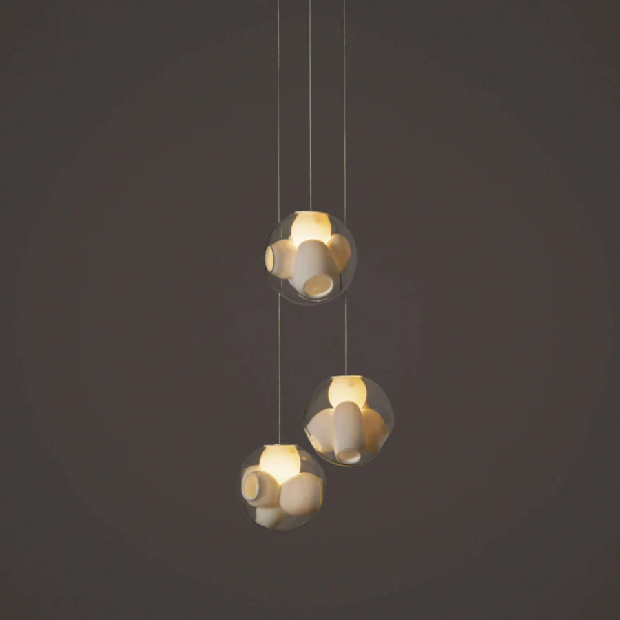 Captivating Bocci 38V Suspension Lamp with clear glass exterior and milk white lamp holder cavities within a spherical enclosure