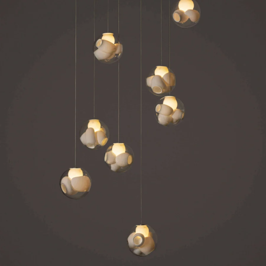 Superior Bocci 38V Suspension Lamp with cascading hand-blown clear glass spheres and uniquely sculpted milk white interiors