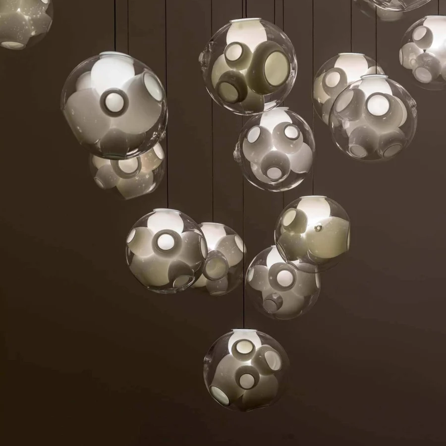 Superior Bocci 38V Single Suspension Lamp lighting fixture crafted in clear glass with milk white interior lamp holder cavities