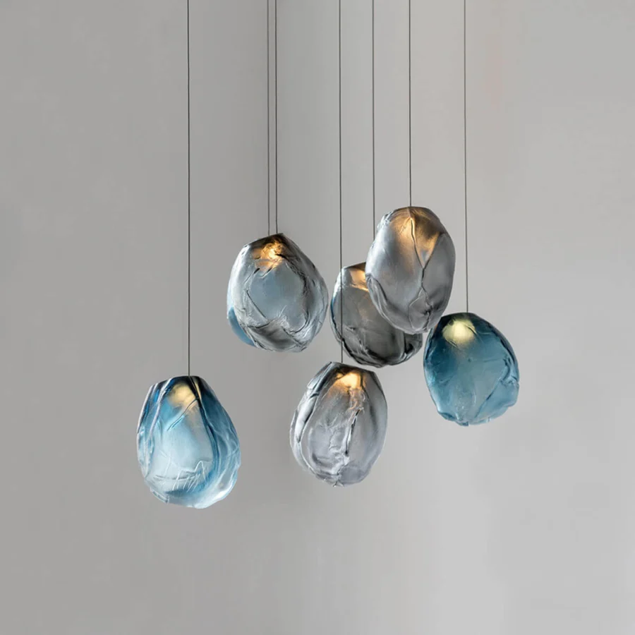 Distinguished Bocci 73V suspension lamp with a tear-drop silhouette crafted from textured glass and braided metal coaxial cable in brushed nickel