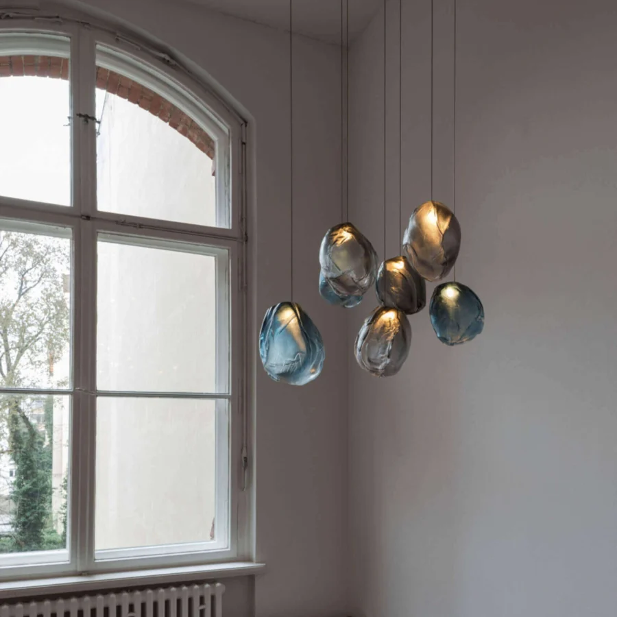 Captivating Bocci 73V single suspension lamp crafted in molten glass with blue gradient and brushed nickel canopy
