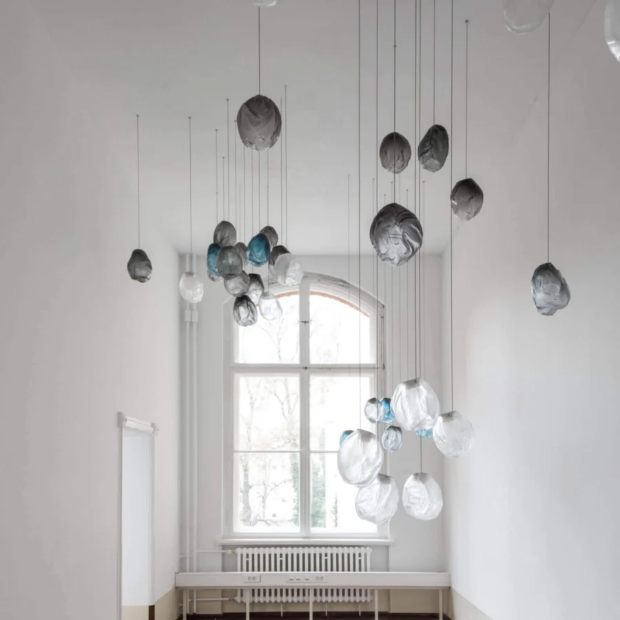Distinguished Bocci 73V single suspension lamp crafted in clear glass with braided metal coaxial cable and brushed nickel canopy