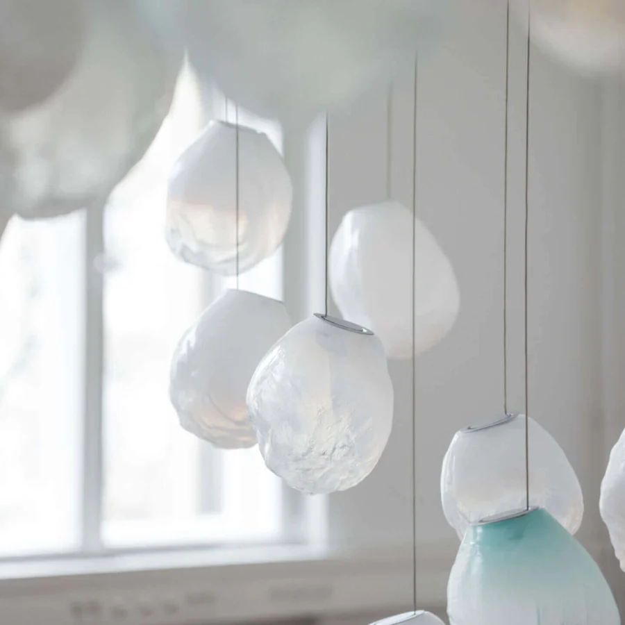 Elegant Bocci 73V single suspension lamp crafted in translucent pale aqua glass with a subtly textured matte finish