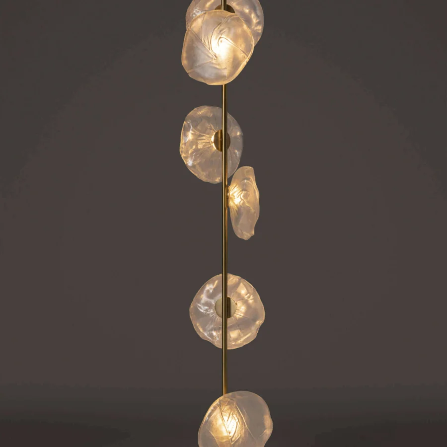 Distinguished Bocci 73 Stem Floor Lamp with clear glass shades and a polished brass stem built upon a round brass base