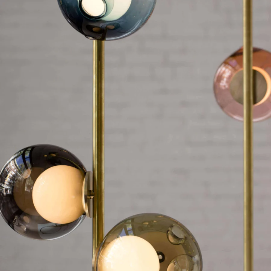 Distinguished Bocci 28 Stem Ceiling Lamp with slender brass stems supporting uniquely distorted glass spheres in gradient gray, blue, and pink hues