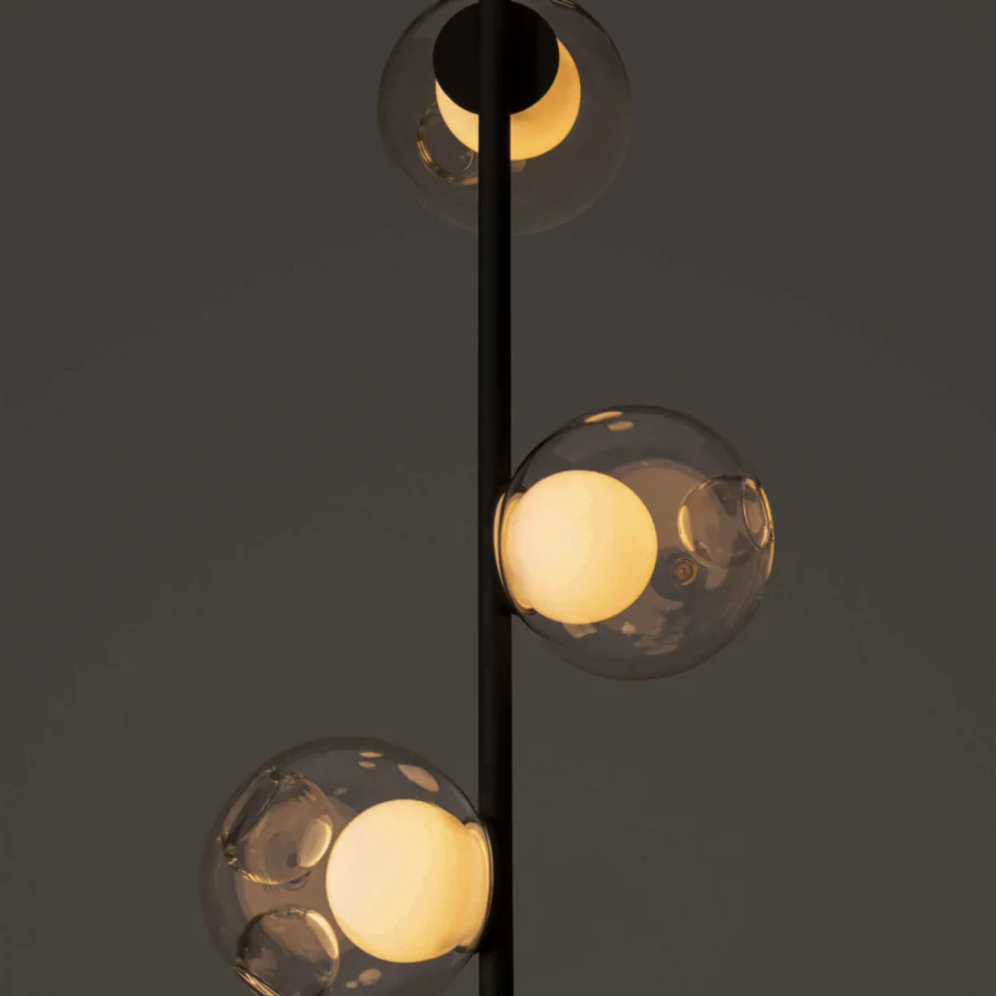 Exceptional Bocci 28 Stem Ceiling Lamp with a black metal stem and clear glass spheres encasing milk white lamp holders