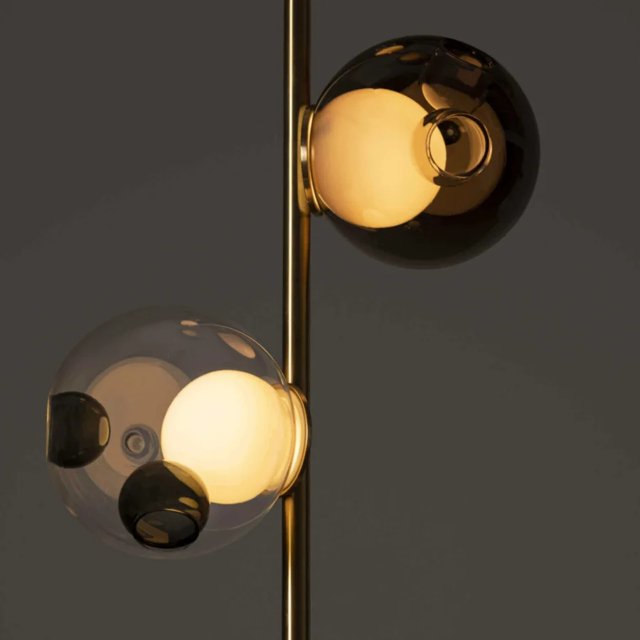 Superior Bocci 28 Stem Ceiling Lamp with brass finish and uniquely distorted clear glass spheres encasing a milk white lamp holder