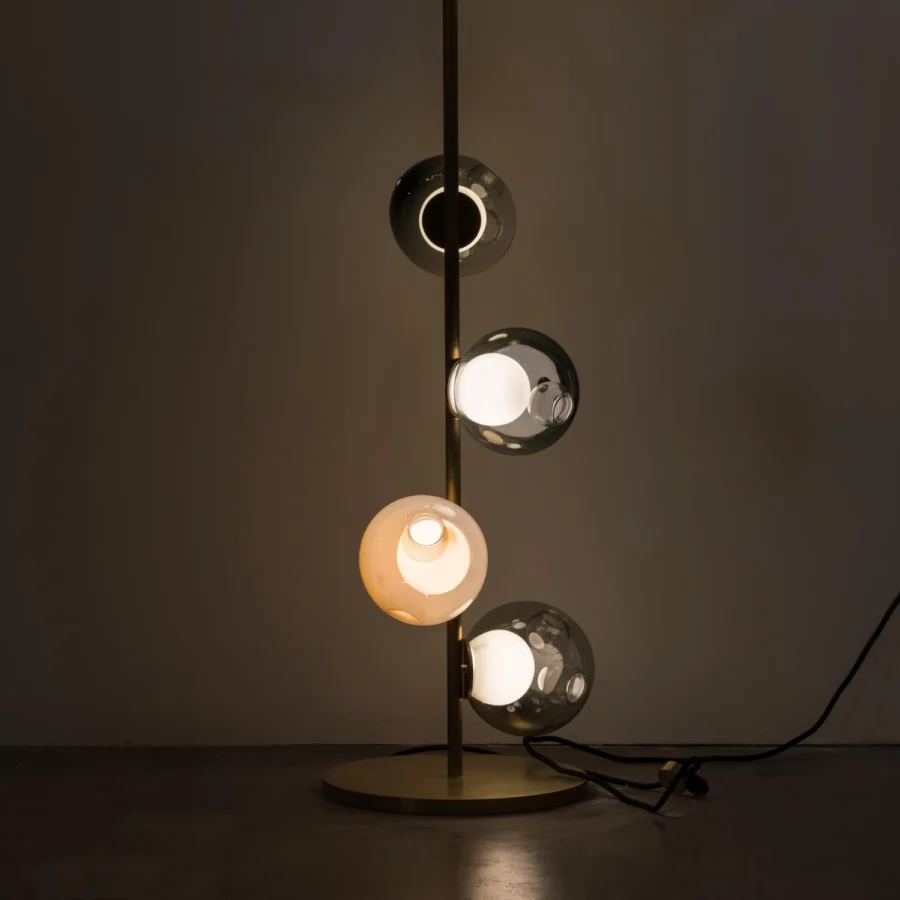 Elegant Bocci 28 Stem Floor Lamp with satin brass finish and uniquely distorted clear, milk white glass exterior spheres