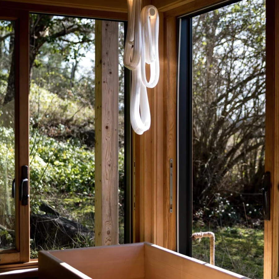 Distinguished Bocci 87 Random Suspension Lamp pendant with pearlescent glass loops emitting a soft warm light