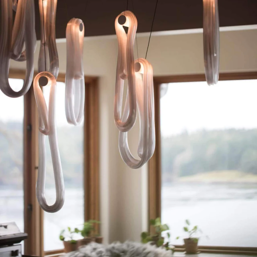 Exceptional Bocci 87 Random Suspension Lamp pendant with continuous pearlescent glass loops emitting a gentle gradient of warm orange light