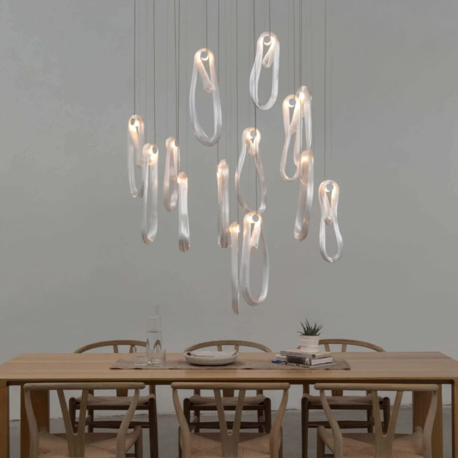 Luxury Bocci 87 Random suspension lamp crafted in pale gray glass with satin metal rods and gentle illumination