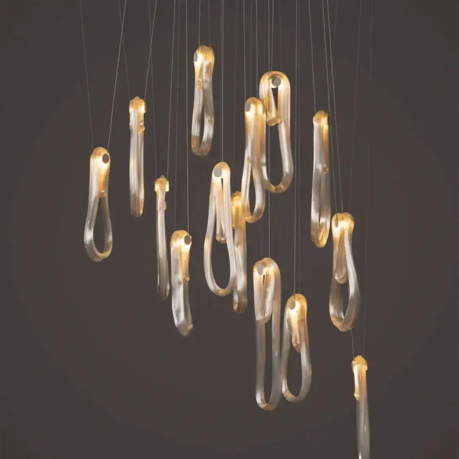 Distinguished Bocci 87 Random suspension lamp crafted in uniquely stretched glass forms with a pearlescent amber glow