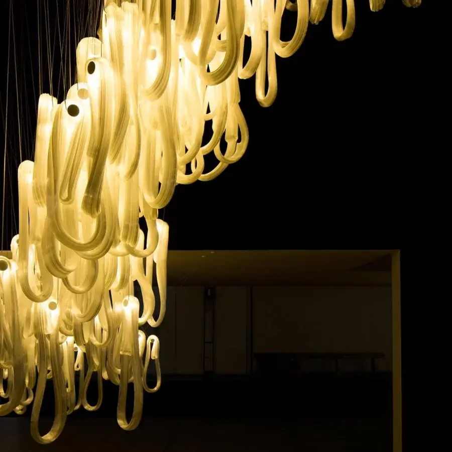 Elegant Bocci 87 Random suspension lamp with hand-blown glass loops and pearlescent optical quality emitting warm yellow light