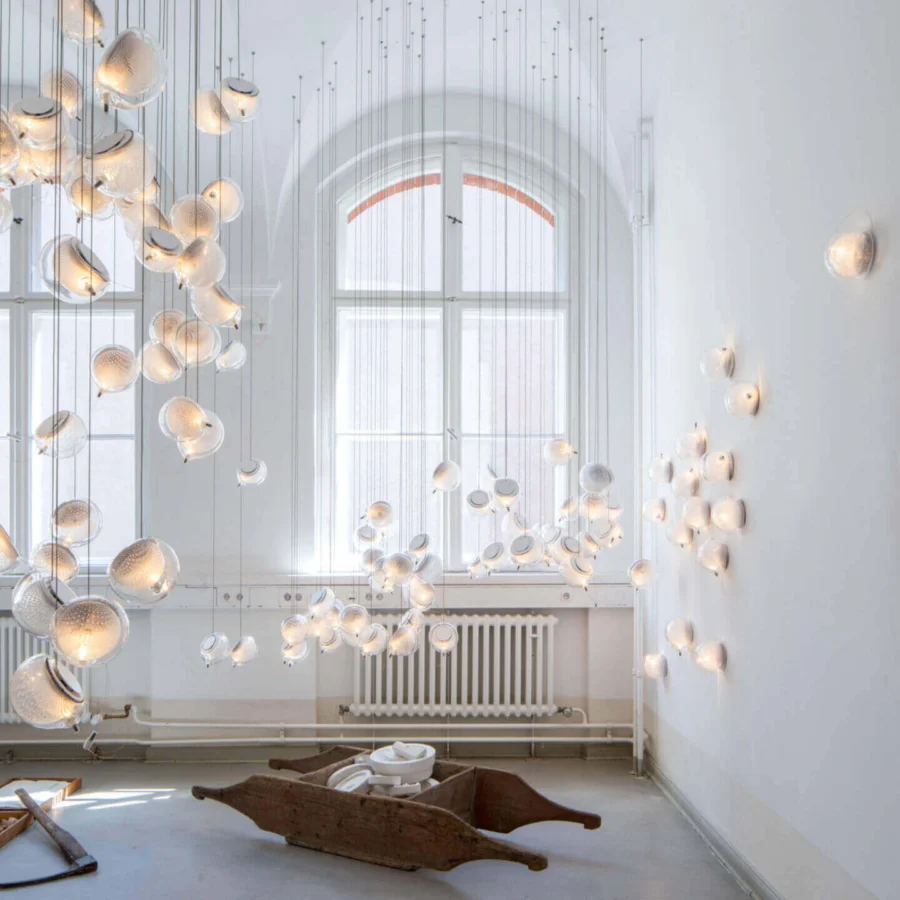 Exceptional Bocci 76 Single Suspension Lamp with hot white and clear glass plus delicate copper mesh detailing
