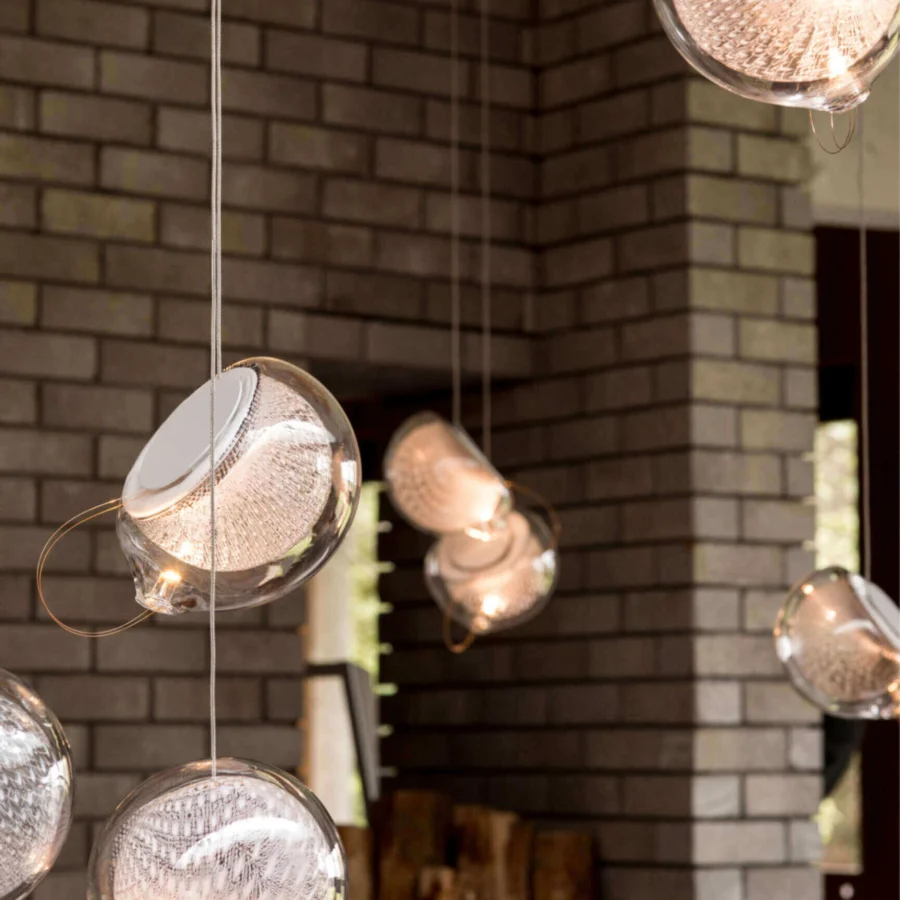 Distinguished Bocci 76 Single Suspension Lamp crafted in hot white and clear glass with copper mesh detailing and a silvery-grey finish