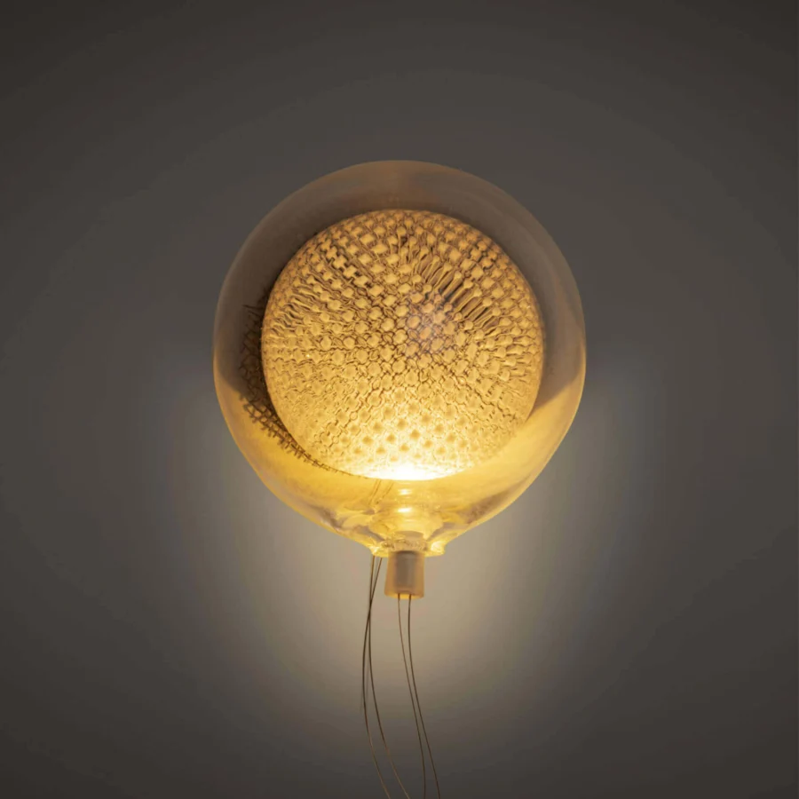 Distinguished Bocci 76 Surface Light crafted in hot white and clear glass with delicate copper mesh detailing