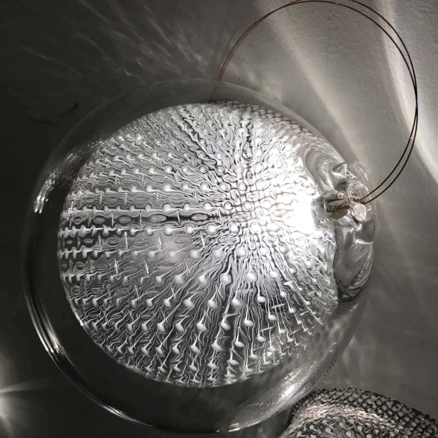 Exceptional Bocci 76 Surface Light crafted in hot white and clear glass with delicate copper mesh detailing and glossy finish